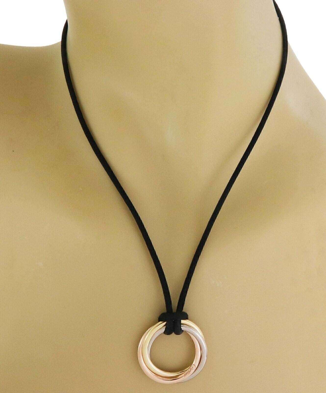 Cartier Trinity 18k Tri color Gold Pendant Necklace on Black Cord w/Cert | Necklaces | Cartier, catalog, Designer Jewelry, Necklaces, Pendants | Cartier