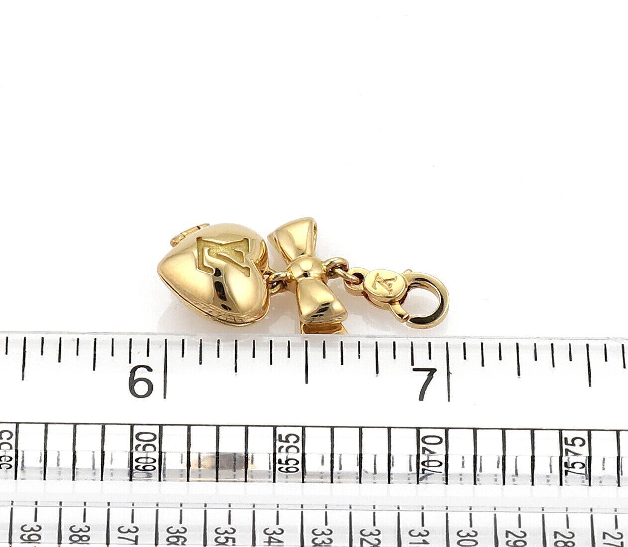 Louis Vuitton Heart & Bow Locket 18k Yellow Gold Charm Pendant