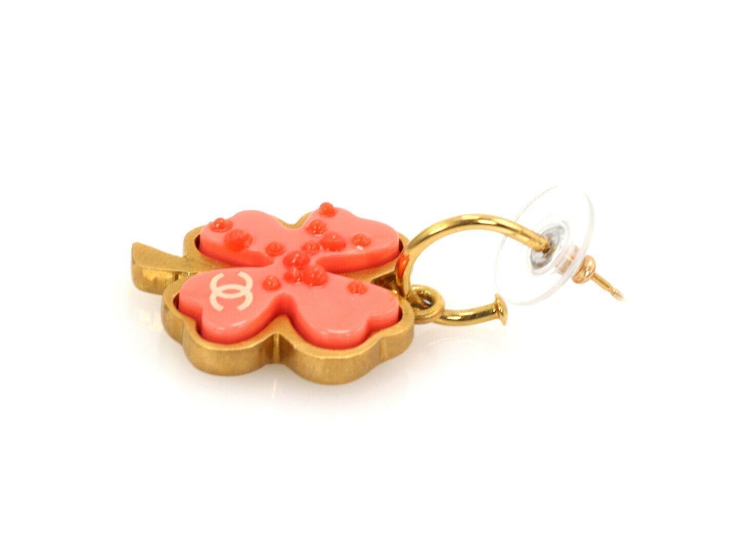 Chanel Orange Resin Four Leaf Clover Yellow Gold Tone Metal Dangle Earrings