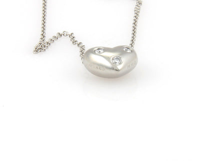 Tiffany & Co. Etoile Diamond Platinum 3 Stone Heart Slide Pendant Necklace