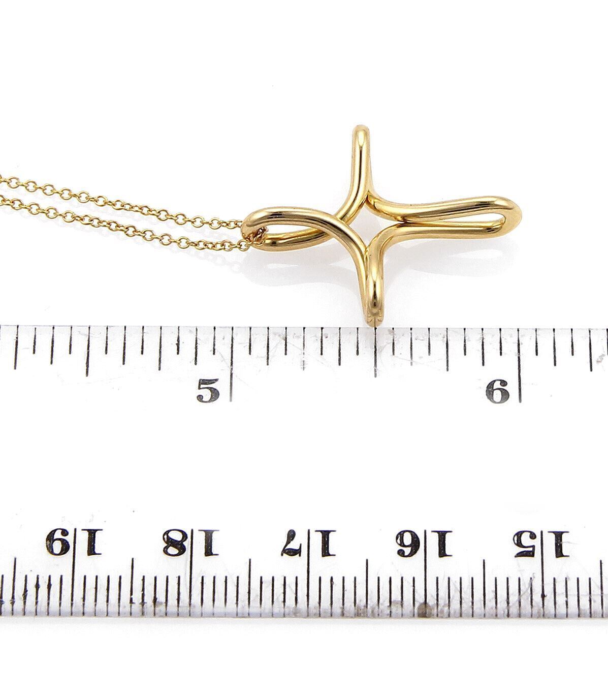 Tiffany & Co. Elsa Peretti Infinity 18k Yellow Gold Cross Pendant Necklace