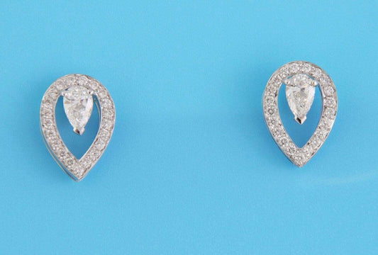 Fred of Paris Lovelight Pear Shaped Diamond 18k White Gold Earrings | Earrings | catalog, Designer Jewelry, Earrings, Fred of Paris | Fred of Paris