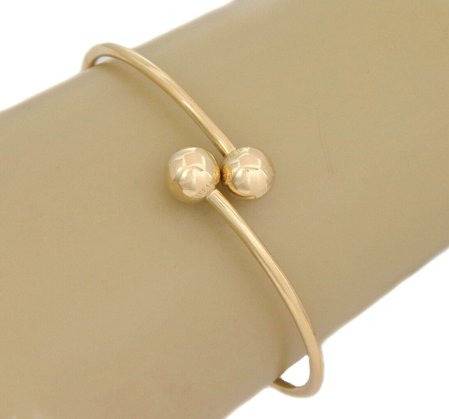 Tiffany & Co. Hardwear 8mm Ball Bypass 18k Yellow Gold Bangle Bracelet | Bracelets | Bangles, Bracelets, catalog, Designer Jewelry, Hardwear, Tiffany & Co. | Tiffany & Co.