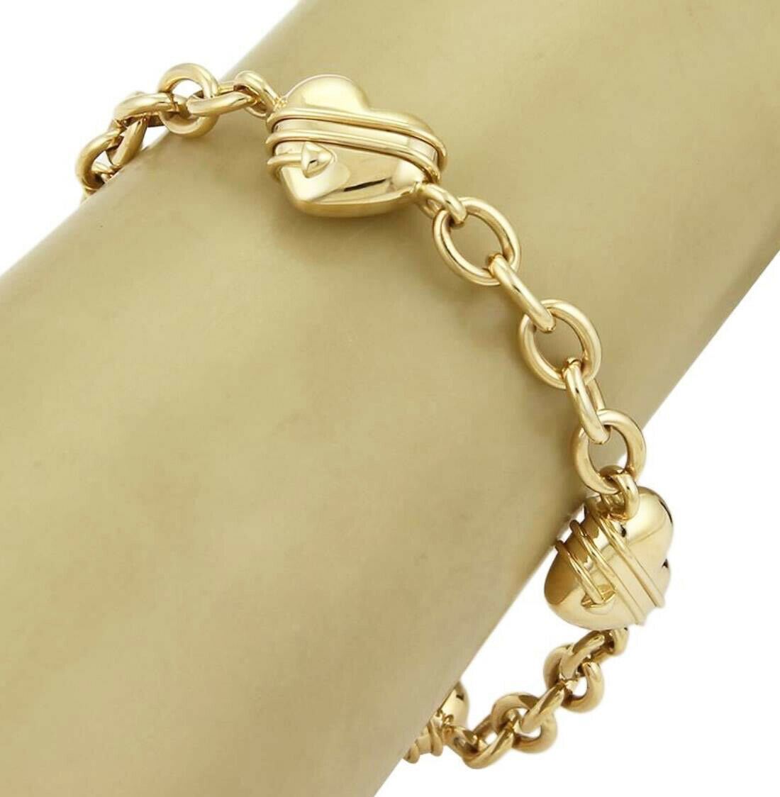 Tiffany & Co. 18k Yellow Gold Cupid 4 Heart Charms Chain Link Bracelet | Bracelets | Bracelets, catalog, Designer Jewelry, Tiffany & Co. | Tiffany & Co.