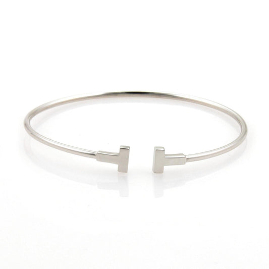 Tiffany & Co. T Wire 18k White Gold Flex Cuff Band Bracelet | Bracelets | Bangles, Bracelets, catalog, Designer Jewelry, Tiffany & Co. | Tiffany & Co.