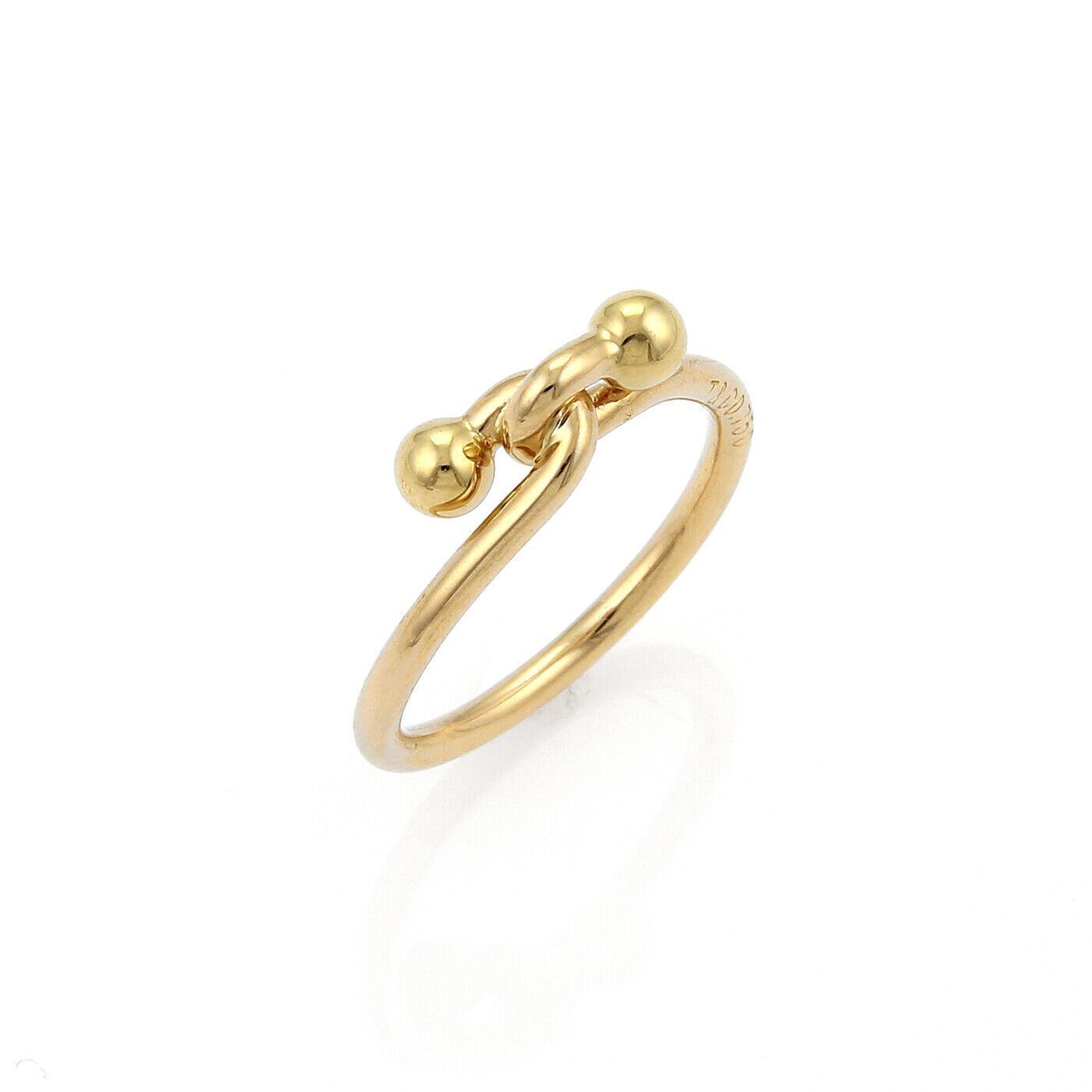 Tiffany & Co. 18k Yellow Gold Double Hook Band Ring | Rings | catalog, Designer Jewelry, Rings, Tiffany & Co. | Tiffany & Co.