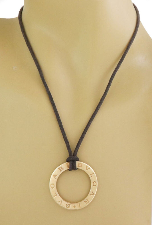 Bvlgari 18k Yellow Gold Open Wave Design Engraved Pendant & Cord Necklace | Necklaces | Bvlgari, catalog, Designer Jewelry, Necklaces, Pendants | Bvlgari