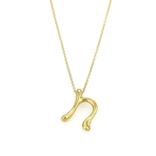 Tiffany & Co. Elsa Peretti Initial n 18k Yellow Gold Pendant Necklace | Necklaces | catalog, Designer Jewelry, Elsa Peretti, Necklaces, Pendants, Tiffany & Co. | Tiffany & Co.